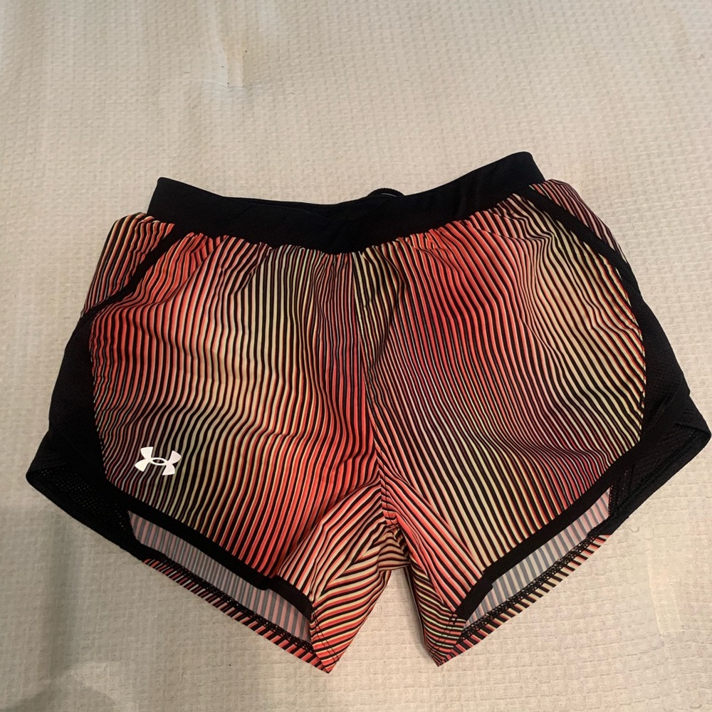 Under Armor running shorts. Excellent condition. Never been worn.